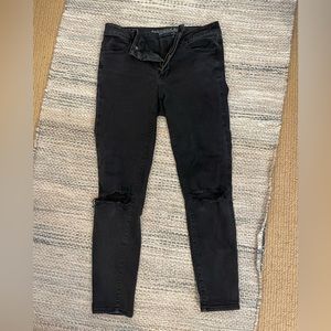 Ripped black skinny jeans